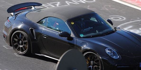 1557973644802059.jpg new-porsche-911-turbo-cabriolet-spotted-on-nurburgring-shows-widebody-look-134469_1 (1).jpg